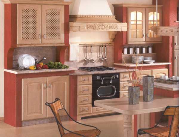 Dal legno massiccio di acacia nasce questa cucina in stile classico, disponibile nelle finiture decap beige e noce, con la possibilit di realizzarla in muratura e di inserire ante a vetro ed a griglia.